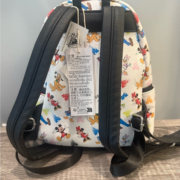 Loungefly Disney Parks White Backpack with Colorful Characters - Picture 2 of 7